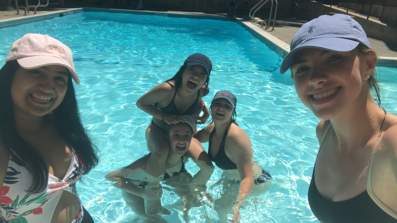 Kids swiming in the rec pool