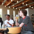students talking at a table